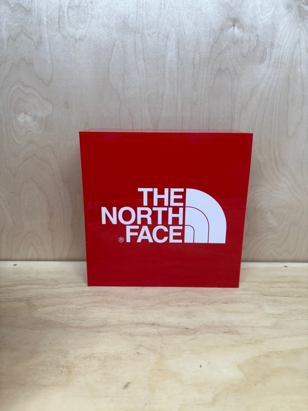 The North Face Red and White Logo Display Panel